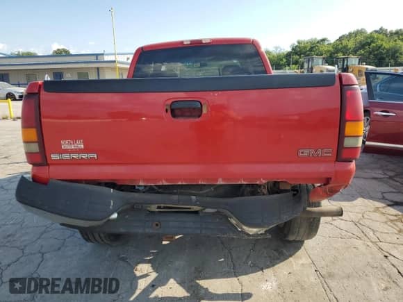 2000 GMC Sierra 1500 SLE with VIN 1GTEK19T2YZ157233, listed as a Copart auction lot 68809595 with 371,111 mi miles and Salvage title. Bid and sale history available at DreamBid. Image 6.