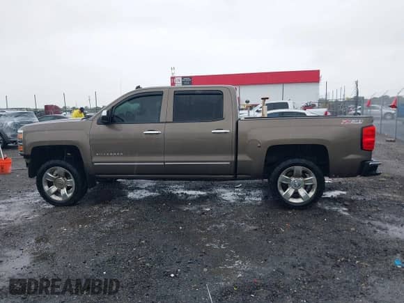 2014 Chevrolet Silverado 1500 LTZ with VIN 3GCUKSEC6EG167024, listed as a IAAI auction lot 42337467 with 198,721 mi miles and . Bid and sale history available at DreamBid. Image 15.