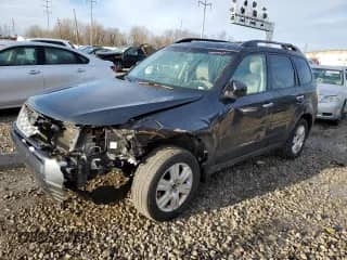 2011 Subaru Forester X Limited z VIN JF2SHBFC8BH762271, wystawiony jako Copart lot #49983265 z przebiegiem 131 908 mil mil oraz Szkoda całkowita • Salvage title. Historia ofert i sprzedaży dostępna na DreamBid. Obrazek 1.