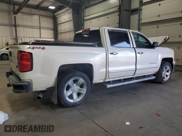 2015 Chevrolet Silverado 1500 LTZ with VIN 3GCUKSEC6FG127124, listed as a Copart auction lot 71790105 with 202,978 mi miles and Salvage title. Bid and sale history available at DreamBid. Image 3.