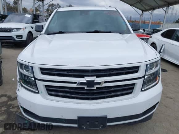 2020 Chevrolet Tahoe LT with VIN 1GNSCBKC0LR290170, listed as a IAAI auction lot 42129712 with 57,414 mi miles and . Bid and sale history available at DreamBid. Image 12.