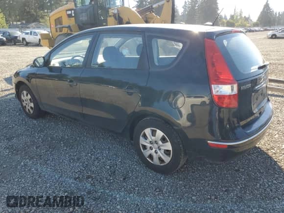 2010 Hyundai Elantra GLS with VIN KMHDB8AE1AU084811, listed as a Copart auction lot 84753135 with 140,467 mi miles and Salvage title. Bid and sale history available at DreamBid. Image 2.