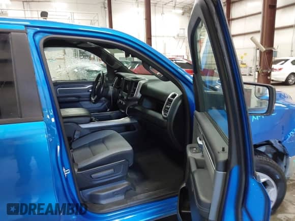 2021 Ram 1500 Big Horn with VIN 1C6SRFFT7MN694639, listed as a IAAI auction lot 43253486 with 77,360 mi miles and . Bid and sale history available at DreamBid. Image 5.