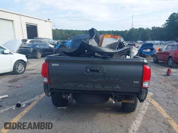 2017 Toyota Tacoma SR5 with VIN 3TMCZ5AN7HM115200, listed as a IAAI auction lot 43115086 with 117,000 mi miles and . Bid and sale history available at DreamBid. Image 17.