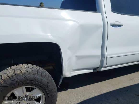 2016 Chevrolet Silverado 1500 LT with VIN 1GCUKREC1GF145767, listed as a IAAI auction lot 41869630 with 133,407 mi miles and . Bid and sale history available at DreamBid. Image 17.