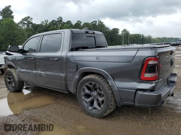 2021 Ram 1500 Limited z VIN 1C6SRFHM5MN583979, wystawiony jako Copart lot #65342945 z przebiegiem 106 521 mil mil oraz Szkoda całkowita • Salvage title. Historia ofert i sprzedaży dostępna na DreamBid. Obrazek 2.