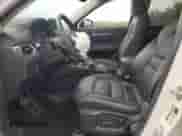 2025 Mazda CX-5 S Preferred z VIN JM3KFBCL4S0605478, wystawiony jako Copart lot #71835935 z przebiegiem 13 592 mil mil oraz Szkoda całkowita • Salvage title. Historia ofert i sprzedaży dostępna na DreamBid. Obrazek 7.