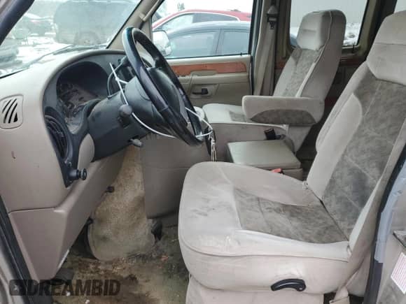 2002 Ford Econoline Cargo z VIN 1FDRE14W12HB32827, wystawiony jako Copart lot #84039804 z przebiegiem 263 809 mil mil oraz Czysty tytuł • Clean title. Historia ofert i sprzedaży dostępna na DreamBid. Obrazek 7.