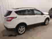 2018 Ford Escape SE with VIN 1FMCU9GD6JUC77191, listed as a IAAI auction lot 42298565 with 68,806 mi miles and . Bid and sale history available at DreamBid. Image 4.