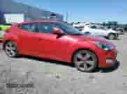 2013 Hyundai Veloster w/Gray Int z VIN KMHTC6AD7DU087124, wystawiony jako Copart lot #71488025 z przebiegiem 222 932 mil mil oraz Szkoda całkowita • Salvage title. Historia ofert i sprzedaży dostępna na DreamBid. Obrazek 4.