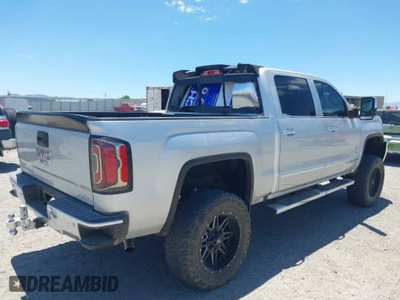 2017 GMC Sierra 1500 SLT z VIN 3GTU1NER3HG498785, wystawiony jako IAAI lot #42629458 z przebiegiem 41 962 mil mil oraz . Historia ofert i sprzedaży dostępna na DreamBid. Obrazek 4.