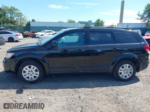 2019 Dodge Journey SE Value with VIN 3C4PDCAB9KT872056, listed as a IAAI auction lot 43206303 with 96,372 mi miles and . Bid and sale history available at DreamBid. Image 14.