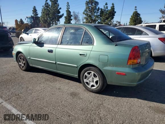 2003 Hyundai Accent GL с VIN KMHCG45C63U430403, выставлен на аукционе Copart как лот 86430724 с пробегом 74 200 миль миль и Списание • Salvage title. История ставок и продаж доступна на DreamBid. Изображение 2.