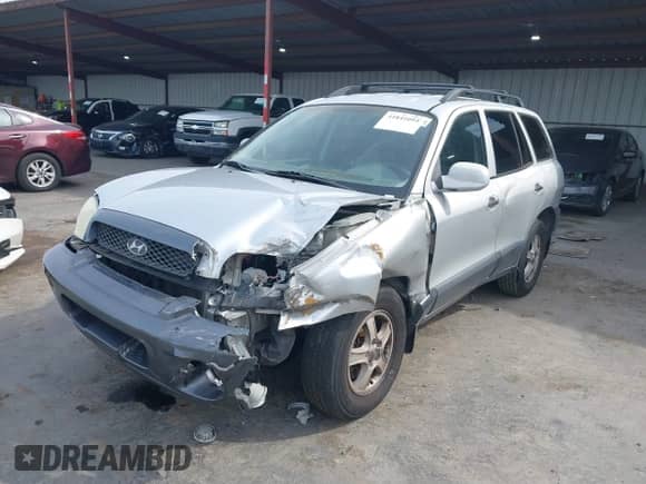 2002 Hyundai Santa Fe GLS z VIN KM8SC13D82U324289, wystawiony jako IAAI lot #41841094 z przebiegiem 217 578 mil mil oraz . Historia ofert i sprzedaży dostępna na DreamBid. Obrazek 2.