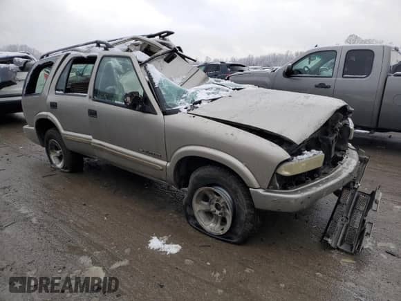 2003 Chevrolet Blazer LS с VIN 1GNCS13X63K129026, выставлен на аукционе Copart как лот 84567954 с пробегом Не указан миль и Списание • Salvage title. История ставок и продаж доступна на DreamBid. Изображение 4.