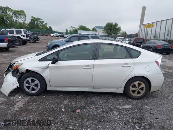 2013 Toyota Prius One with VIN JTDKN3DU5D5571047, listed as a IAAI auction lot 42698913 with 139,531 mi miles and . Bid and sale history available at DreamBid. Image 14.