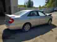 2004 Toyota Camry XLE с VIN 4T1BF30K14U579715, выставлен на аукционе Copart как лот 71749745 с пробегом 84 539 миль миль и Списание • Salvage title. История ставок и продаж доступна на DreamBid. Изображение 3.