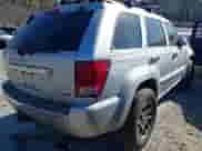 2009 Jeep Grand Cherokee with VIN 1J8HR68T39C540795, listed as a IAAI auction lot 41379112 with 236,624 mi miles and . Bid and sale history available at DreamBid. Image 4.