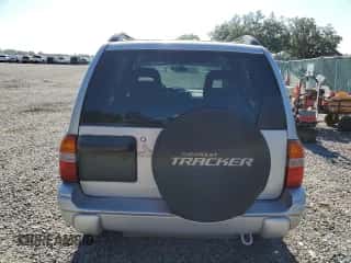 2004 Chevrolet Tracker LT z VIN 2CNBE634X46901610, wystawiony jako Copart lot #55879224 z przebiegiem 213 358 mil mil oraz Nie do naprawy • Non repairable. Historia ofert i sprzedaży dostępna na DreamBid. Obrazek 6.