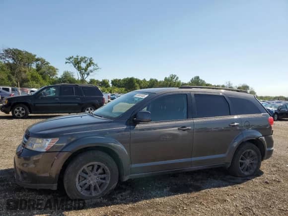 2016 Dodge Journey SXT with VIN 3C4PDCBG3GT218980, listed as a Copart auction lot 69852485 with 186,758 mi miles and Salvage title. Bid and sale history available at DreamBid. Image 1.
