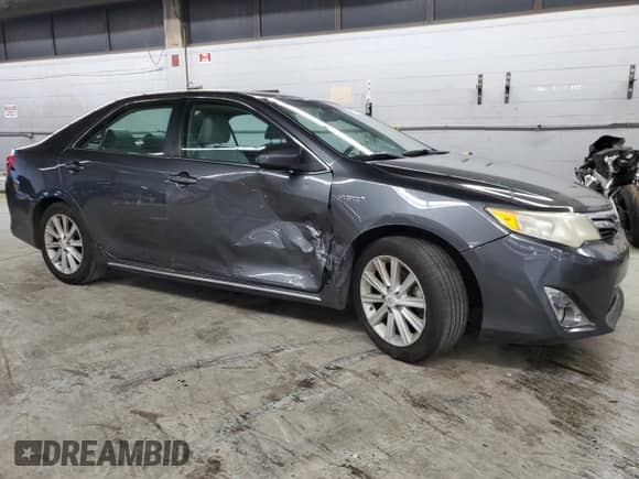 2012 Toyota Camry LE z VIN 4T1BD1FK0CU031950, wystawiony jako Copart lot #80570545 z przebiegiem 230 553 mil mil oraz Szkoda całkowita • Salvage title. Historia ofert i sprzedaży dostępna na DreamBid. Obrazek 4.