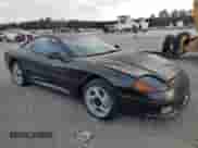 1991 Dodge Stealth with VIN JB3XE74C2MY017971, listed as a Copart auction lot 79442074 with 56,890 mi miles and Salvage title. Bid and sale history available at DreamBid. Image 4.