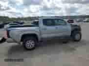 2024 Toyota Tacoma SR5 with VIN 3TMKB5FN1RM023512, listed as a Copart auction lot 68438505 with 5,994 mi miles and Salvage title. Bid and sale history available at DreamBid. Image 3.