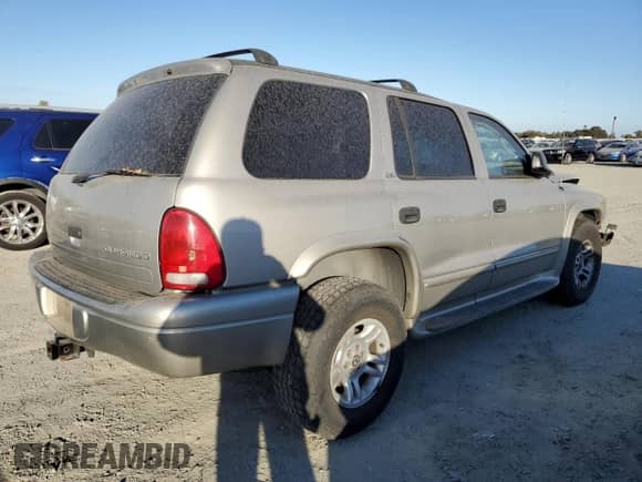 2002 Dodge Durango with VIN 1B8HS58N92F147715, listed as a Copart auction lot 76606574 with 153,819 mi miles and Salvage title. Bid and sale history available at DreamBid. Image 3.