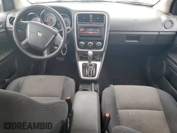 2010 Dodge Caliber SXT с VIN 1B3CB4HA4AD538546, выставлен на аукционе Copart как лот 73461684 с пробегом 220 920 миль миль и Списание • Salvage title. История ставок и продаж доступна на DreamBid. Изображение 8.