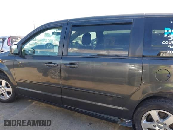 2012 Dodge Grand Caravan SE with VIN 2C4RDGBG1CR389286, listed as a IAAI auction lot 42952196 with 126,267 mi miles and . Bid and sale history available at DreamBid. Image 14.