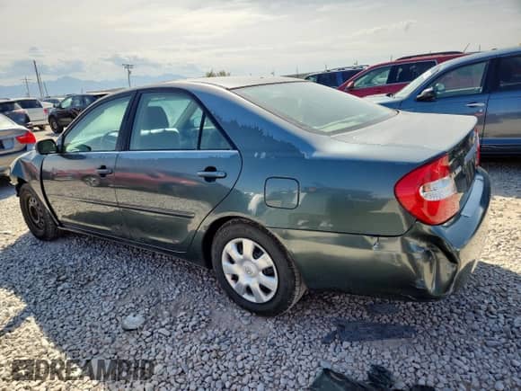 2002 Toyota Camry XLE z VIN 4T1BF32K52U512612, wystawiony jako Copart lot #70961955 z przebiegiem 198 330 mil mil oraz Szkoda całkowita • Salvage title. Historia ofert i sprzedaży dostępna na DreamBid. Obrazek 2.