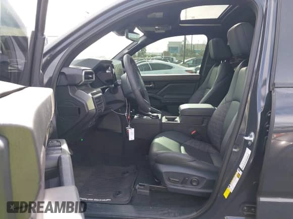 2024 Toyota Tacoma SR5 with VIN 3TMLB5JN5RM051339, listed as a IAAI auction lot 41241754 with 7,181 mi miles and . Bid and sale history available at DreamBid. Image 5.