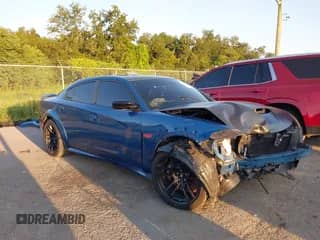 2023 Dodge Charger Scat Pack with VIN 2C3CDXGJ9PH686736, listed as a IAAI auction lot 43147477 with 19,328 mi miles and . Bid and sale history available at DreamBid. Image 1.
