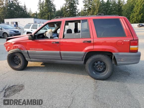 1996 Jeep Grand Cherokee с VIN 1J4EZ58Y5TC142263, выставлен на аукционе Copart как лот 70532894 с пробегом Не указан миль и Списание • Salvage title. История ставок и продаж доступна на DreamBid. Изображение 2.