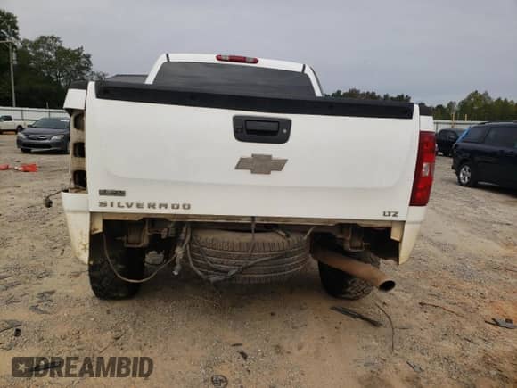 2010 Chevrolet Silverado 1500 with VIN 3GCRKTE28AG275724, listed as a Copart auction lot 76106304 with 256,790 mi miles and Salvage title. Bid and sale history available at DreamBid. Image 6.
