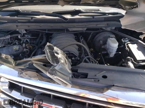 2018 GMC Sierra 1500 SLT z VIN 3GTP1NEC4JG562301, wystawiony jako Copart lot #72045625 z przebiegiem 58 403 mil mil oraz Szkoda całkowita • Salvage title. Historia ofert i sprzedaży dostępna na DreamBid. Obrazek 11.