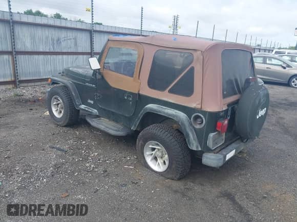 1998 Jeep Wrangler SE z VIN 1J4FY29P8WP792133, wystawiony jako IAAI lot #42149297 z przebiegiem 106 912 mil mil oraz . Historia ofert i sprzedaży dostępna na DreamBid. Obrazek 3.