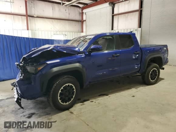 2024 Toyota Tacoma TRD Off Road with VIN 3TMLB5JN6RM026286, listed as a Copart auction lot 81666825 with 27,497 mi miles and Salvage title. Bid and sale history available at DreamBid. Image 1.