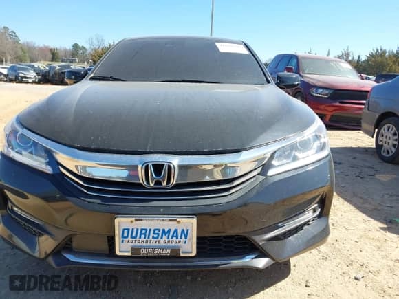 2017 Honda Accord EX-L with VIN 1HGCR3F00HA004780, listed as a IAAI auction lot 41696197 with 135,270 mi miles and . Bid and sale history available at DreamBid. Image 12.