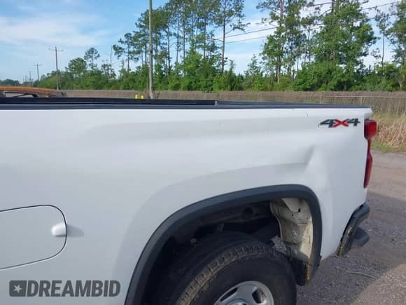 2021 Chevrolet Silverado 2500HD Work Truck z VIN 1GC1YLE76MF105939, wystawiony jako IAAI lot #42603293 z przebiegiem 102 423 mil mil oraz . Historia ofert i sprzedaży dostępna na DreamBid. Obrazek 6.