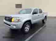 2011 Toyota Tacoma z VIN 3TMLU4EN4BM056696, wystawiony jako Copart lot #91099915 z przebiegiem 287 736 mil mil oraz Czysty tytuł • Clean title. Historia ofert i sprzedaży dostępna na DreamBid. Obrazek 2.