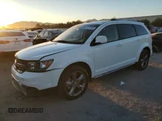 2017 Dodge Journey Crossroad with VIN 3C4PDCGG6HT556593, listed as a Copart auction lot 82143455 with 211,509 mi miles and Salvage title. Bid and sale history available at DreamBid. Image 1.