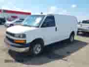 2021 Chevrolet Express Cargo with VIN 1GCWGAFP8M1190582, listed as a IAAI auction lot 42826973 with 125,994 mi miles and . Bid and sale history available at DreamBid. Image 2.
