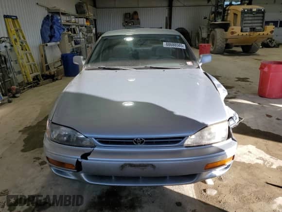 1995 Toyota Camry XLE с VIN 4T1GK13E5SU104108, выставлен на аукционе Copart как лот 88688585 с пробегом 122 003 миль миль и Списание • Salvage title. История ставок и продаж доступна на DreamBid. Изображение 5.