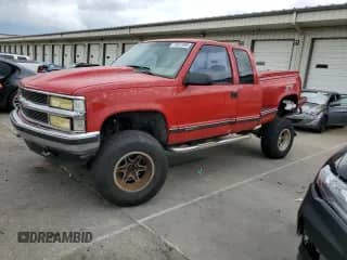 1997 Chevrolet Silverado 1500 with VIN 2GCEK19R0V1155036, listed as a Copart auction lot 70021995 with 229,258 mi miles and Salvage title. Bid and sale history available at DreamBid. Image 1.