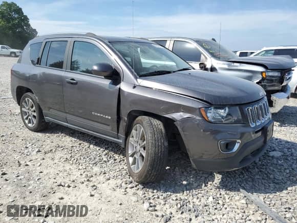 2017 Jeep Compass Latitude with VIN 1C4NJCEA3HD117971, listed as a Copart auction lot 60521815 with 73,376 mi miles and Salvage title. Bid and sale history available at DreamBid. Image 4.