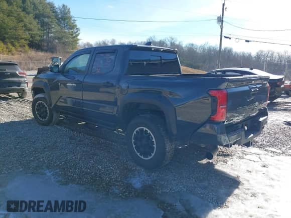 2024 Toyota Tacoma SR5 with VIN 3TYLB5JN6RT026356, listed as a IAAI auction lot 41432726 with 6,414 mi miles and . Bid and sale history available at DreamBid. Image 3.