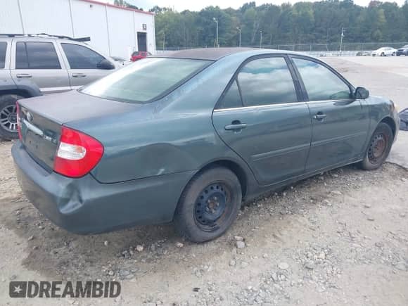 2003 Toyota Camry XLE with VIN 4T1BE32K53U702060, listed as a IAAI auction lot 43316965 with 342,226 mi miles and . Bid and sale history available at DreamBid. Image 4.