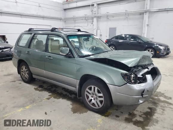2007 Subaru Forester X L.L. Bean with VIN JF1SG67697H739094, listed as a Copart auction lot 58479625 with 249,539 mi miles and Salvage title. Bid and sale history available at DreamBid. Image 4.