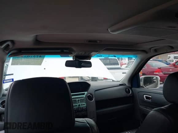 2010 Honda Pilot Touring with VIN 5FNYF3H94AB022723, listed as a IAAI auction lot 42378211 with 326,338 mi miles and . Bid and sale history available at DreamBid. Image 21.